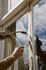 Preparing a window for repainting.