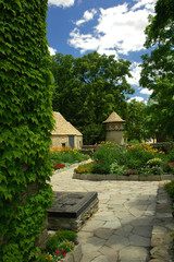 A country cottage garden in bloom in the summer time