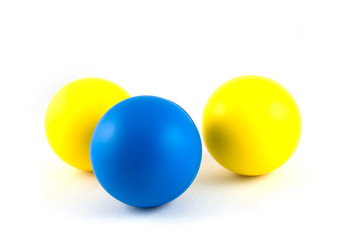yellow balls and a blue ball