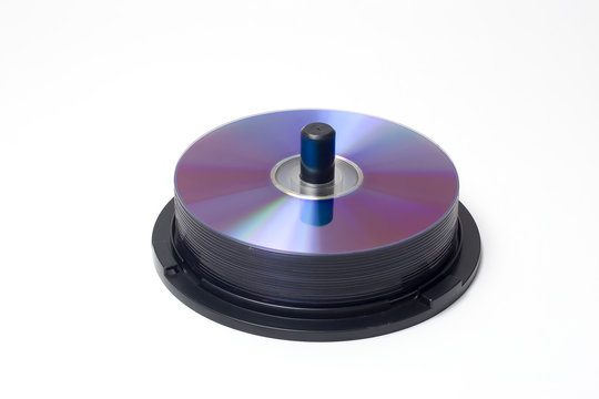 a spindle containing a piles of cd's/dvd's