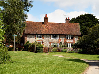 Fototapeta na wymiar Brick and Flint House in Rural England