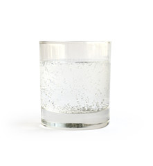 Water in glass on white background