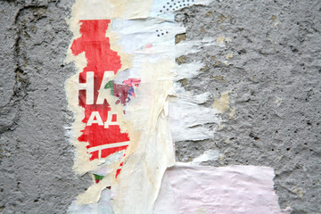 Texture, Varicolored Concrete Wall with Scrap of the Posters