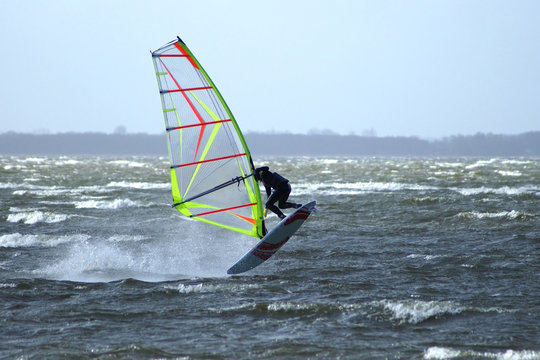 Windsurfer performing an Airjibe
