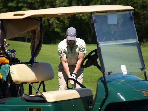 Golf through a golf cart
