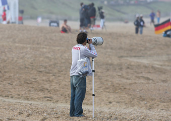 photographe avec téléobjectif