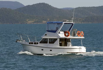 Cercles muraux Whitehaven Beach, île de Whitsundays, Australie fishing boat