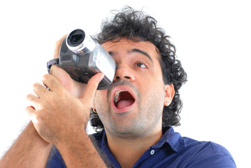 Man holding a camcorder and making a movie.