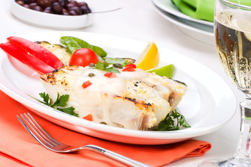 Grilled halibut with capers and pepper sauce