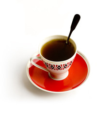 Cup of black coffee on white background