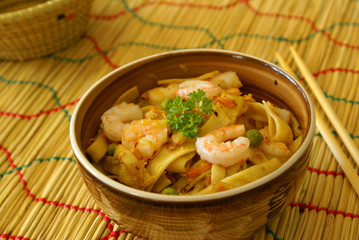 Chow Mein with prawns with chopsticks