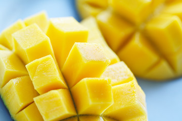 A close up shot of ripe and juicy mangoes