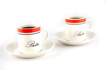 cup and saucer filled with coffee