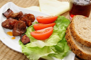 slight lunch - meat with salad and bread