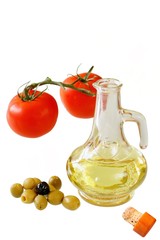 Extra-virgin olive oil and greens olives  on white background