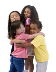 Four young kids having fun and growing up. 