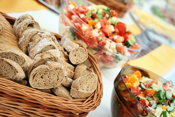 Detail of various breads and salad