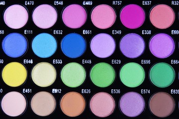 A make-up multi colored palette close up.