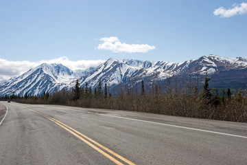 Naklejka premium Road running through Alaska Range