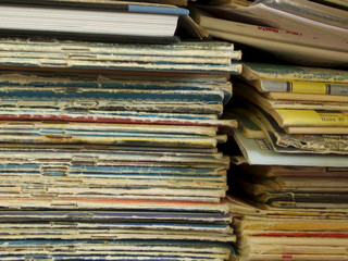 Two stack of old magazines