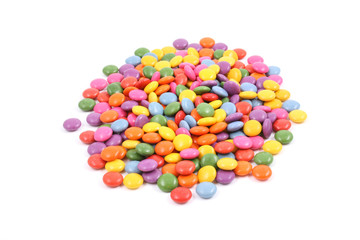 pile of colorful candies isolated on white