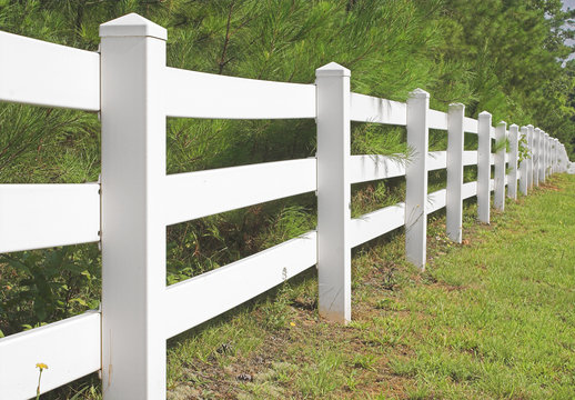 A Decorative White Split Rail Fence.