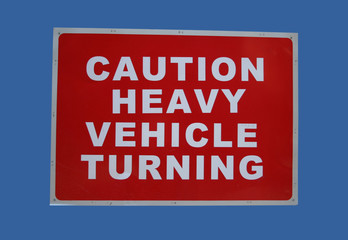 vehicles turning sign