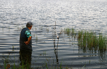 angler in the lake,