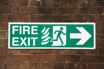 Fire exit sign - obrazy, fototapety, plakaty