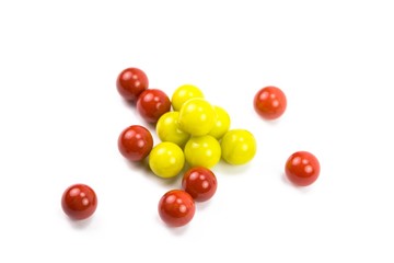 Obraz premium A bunch of marbles chaotically on white