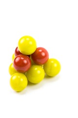 A pyramid made out of mabrles separated on white