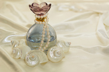 perfume bottle and pearls 2