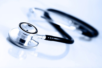 Beautiful silver stethoscope with reflection and blue tint