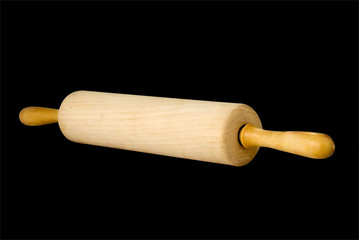 isolated rolling pin on black background
