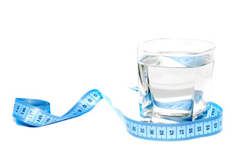 Glass with measuring tape.