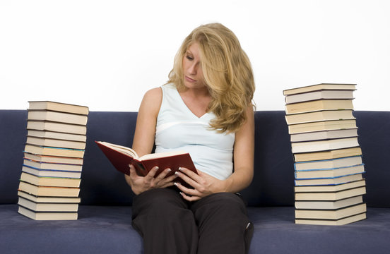 Woman reads books.