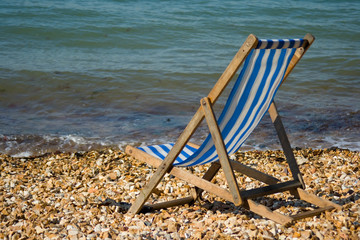 Fototapeta na wymiar Deckchair on the beach