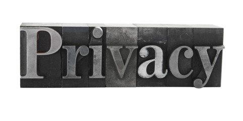 the word 'privacy' in old, inkstained metal type