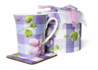 colorful flower decorated tecup and gift box