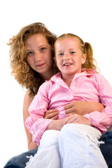 young womand cuddling young child