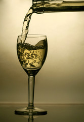 Pouring white wine