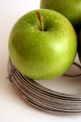 Apple on wire, green apple