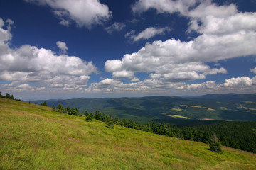 Fototapeta na wymiar Hill and beautiful sky with clouds - summer in czech republic