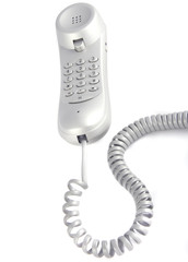 photo of a tone dial telephone with cord