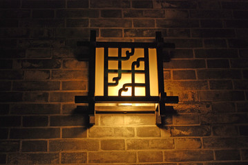 artistic wall lamp in the gardens