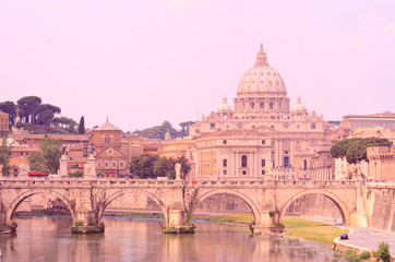 Fototapeta na wymiar St. Peter's Basilica and a bridge on Tiber River, Rome