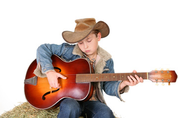 Boy strumming guitar