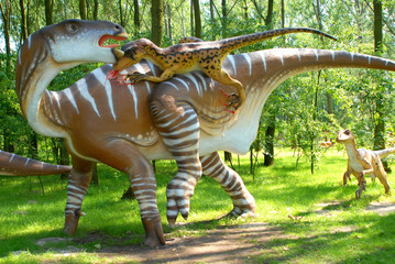 Dinosaur Deinonych attacking Iguanodon in jurassic park, dinosaur series