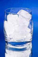 Glass with ice cubes