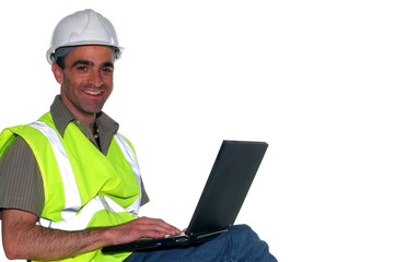 construction manager working on the computer